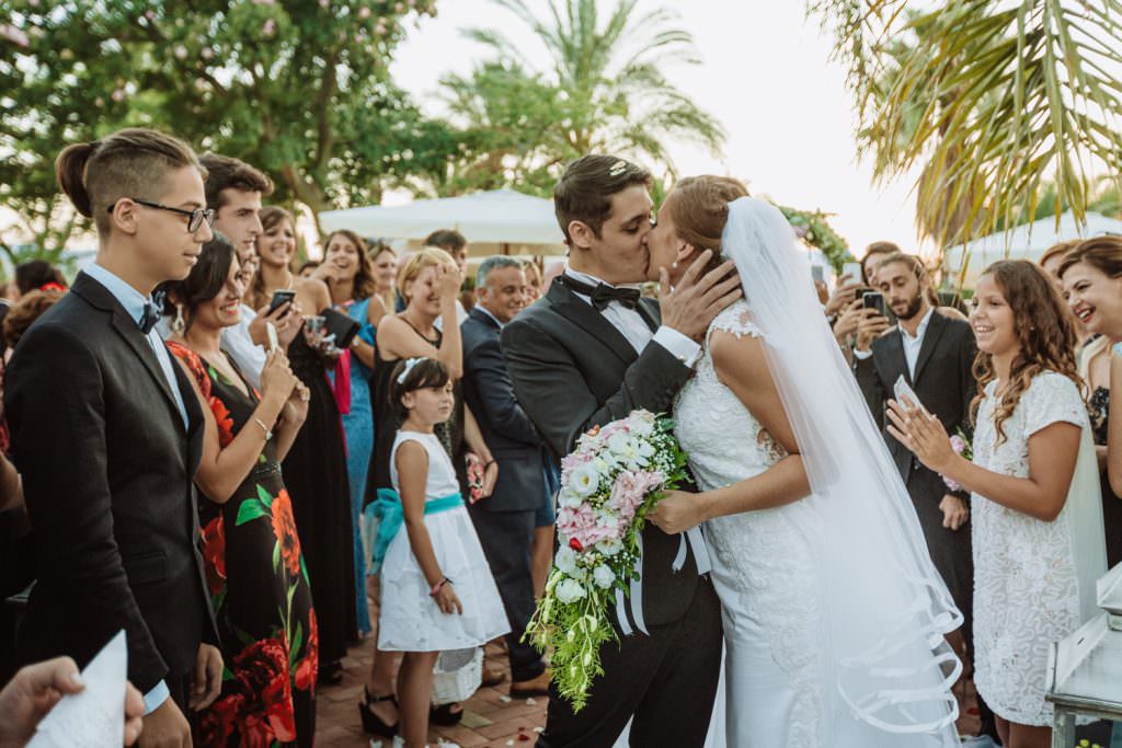 wedding confetti throwing in Christian Wedding in Sicily 